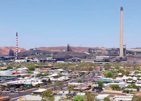 The Mount Isa Mine dominates the town of Mt Isa on a very hot summer day.